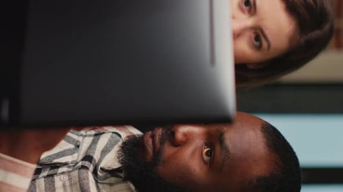 Colleagues Working Together Looking at Computer Screen