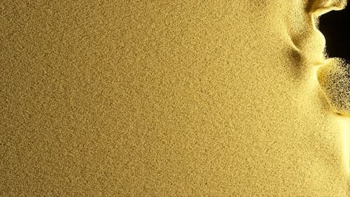Goldene Sanddecke weggeblasen auf einem schwarzen isolierten Hintergrund Airflow Sandkörner Zeitlupe 3d