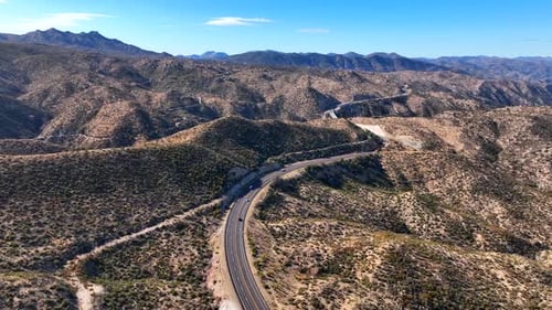 Aerial view of winding road through mountains, United States.