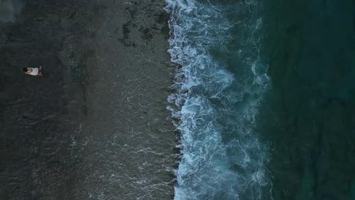 Aerial View The Sun Dips Below the Mediterranean Leaving Behind a Dramatic Sky and Shimmering Waters