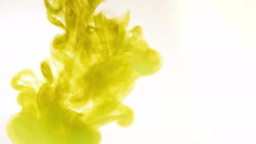 Yellow Ink Spreading Gracefully in Clear Liquid