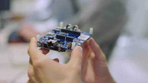 Close Up of Circuit Board Being Held