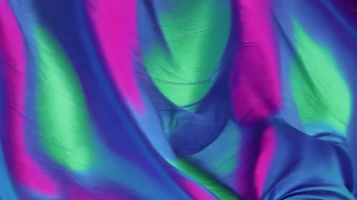 Abstrakter holographischer irisierender Stoff, der in Zeitlupe weht