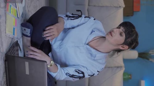 Vertical video of Home office worker woman working relaxed and peacefully.