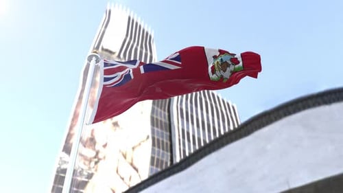 Realistic Bermuda Flag Waving Against Modern City Skyline