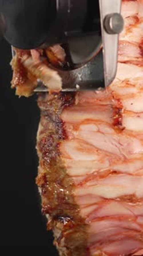Cut the Meat for Doner Kebab Into Thin Pieces