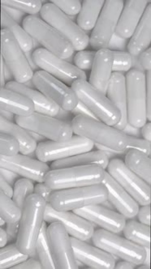 White Capsules or Tablets Rotating Background
