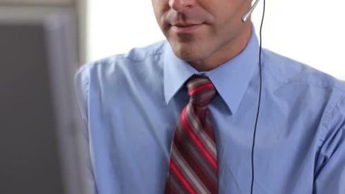 Customer Service Person Talking on Headset in Office 20s