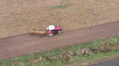 Tractor plowing the field in Ukraine