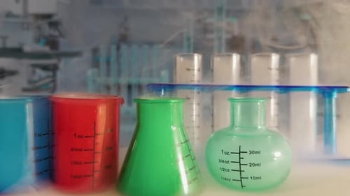 Colorful Beakers with Vapor in Bright Laboratory Setting