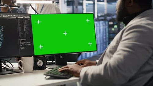 Data Center Admin Using Isolated Screen PC to Monitor Neural Network AI