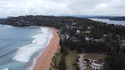 Aerial Perspective of a Charming Small Seaside Town Nestled on a Peninsula