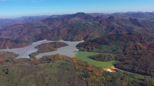 Aerial view of a huge decanting lake, full with toxic mining residuals from a copper and gold mine