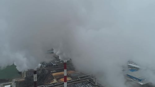 Thermal Power Energy Station View From Height to Pipes in Fog Steam and Smoke From Pipes