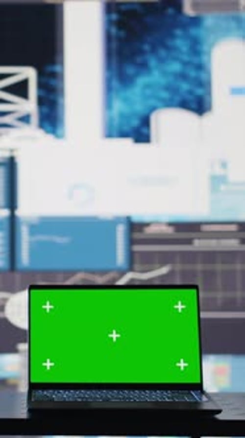 Vertical Video Isolated Copy Space Screen Running on Laptop Next to Fintech Annual Reports