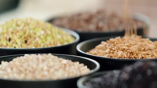 Close Up of Bowls of Different Grains and Seeds