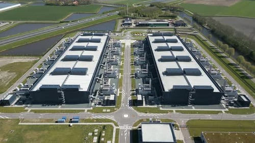 Symmetrical Drone Shot of Twin Data Center Buildings - Middenmeer, North Holland, Netherlands