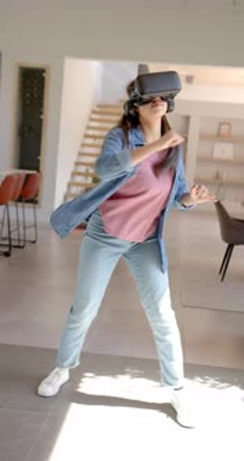 Woman Experiencing Virtual Reality in Modern Home