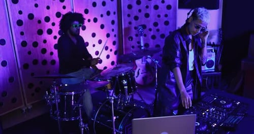 African american band creatively recording music in boutique South Africa studio