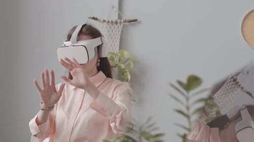 Female Virtual Reality Developer Working in Office