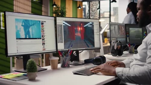 Game Developer Works on Video Game Designing Futuristic Adventure