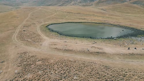 aerial view of the little blue lake in mountain