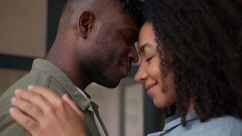 Loving Couple Embracing Intimately Indoors