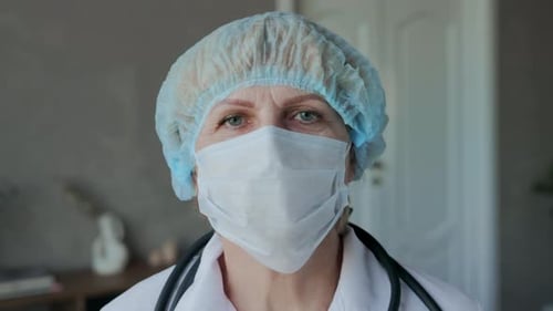 Healthcare Worker Wearing Mask and Surgical Cap