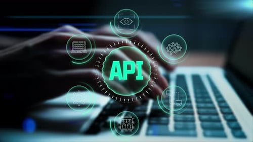 API Application Programming Interface Concept. A Programmer Types On A Laptop