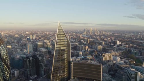 Flying Over London with Canary Wharf Visible in the Background