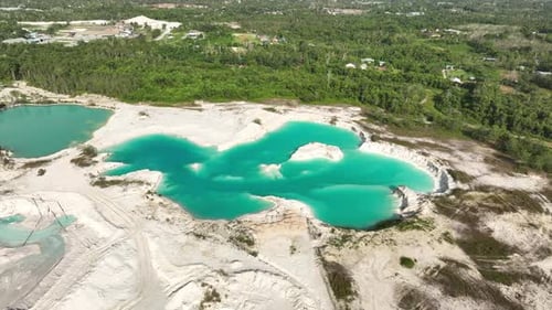 Cinematic Aerial of Blue Mining Lake in Belitung
