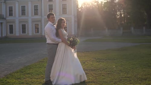 Wedding couple in the park. Young couple in love at sunset