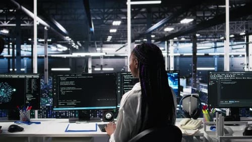 Technicians in Data Center Review AI Diagnostics Analyzing Neural Networks