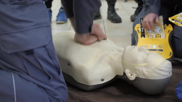 First aid cardiopulmonary resuscitation training demonstration, closeup ...