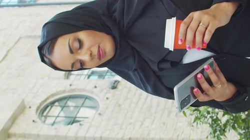 Portrait of Young and Confident Muslim Business Woman with in Hijab Middle Eastern Office Worker or