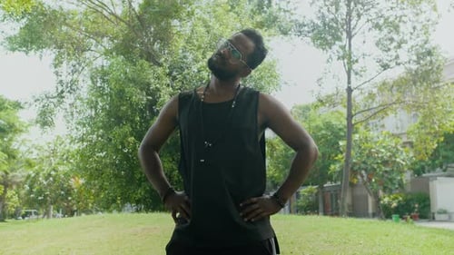 Young Man Training in Park in Morning