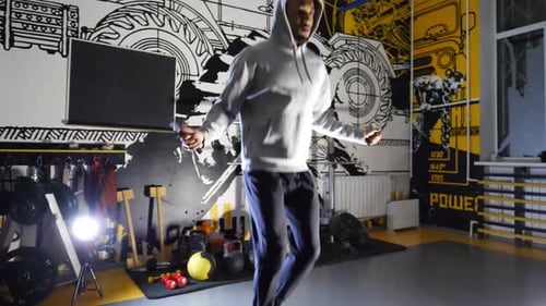 Young Afro American Sportsman Skipping with a Jump Rope at Modern Gym Athletic Black Guy Doing