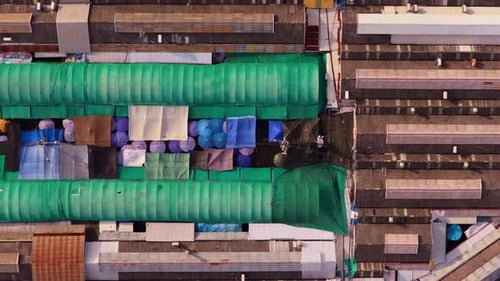 Captivating Aerial Top Down View Flying Over Chatuchak Weekend Market in Bangkok Thailand Famous