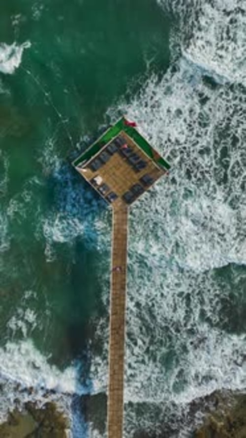 Vertical Video Stunning Coastal Hotel with Pristine Beaches Sparkling Pools and Scenic Tennis