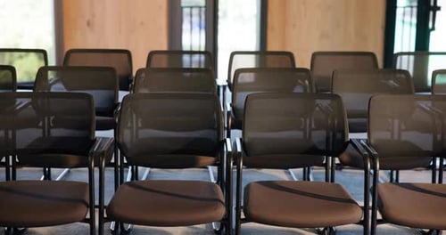 Chairs, seminar and empty hall for event, business forum and conference with meeting venue