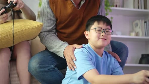 Family Plays Video Games Together in the Living Room