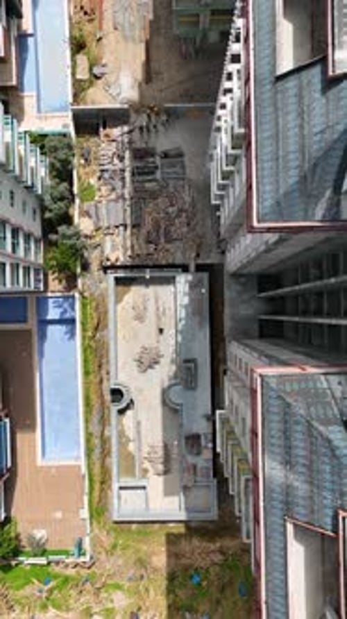 Vertical Video Aerial View Construction Site Work on Site