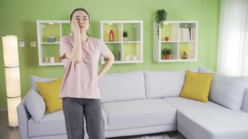 Young asian woman losing her balance and dizzy is fainting.