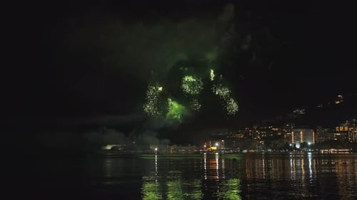 Fireworks with Colorful Lights Over Sea