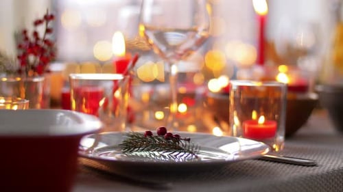 Festive Christmas table setting with candles and decorations
