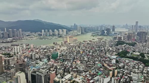 An aerial view of a city with a river running through it
