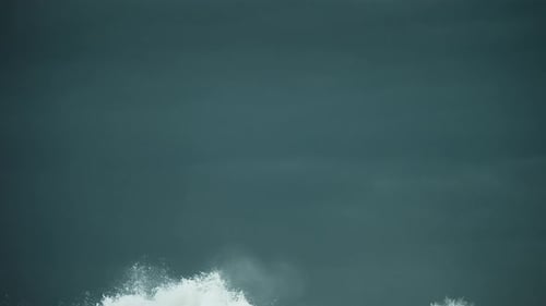 Crashing Ocean Waves on Dark Overcast Day