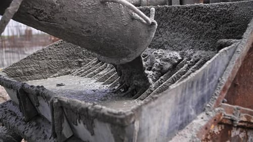 Pouring Concrete in the Construction Equipment