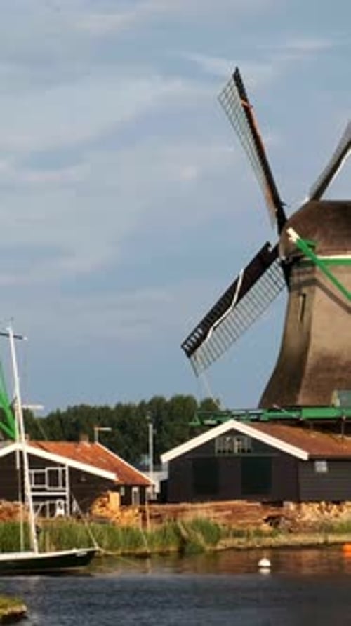 Windmills at Zaanse Schans in Holland on Sunset Zaandam Nether
