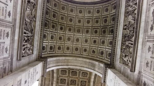 Sculptured Roses On The Ceiling Of The Arc de Triomphe During Sunny Day In Paris, France. Low Angle